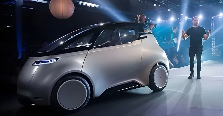 Lewis Horne presenting the Uniti One electric vehicle at the U17 launch